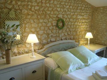 furniture and white cotton bedlinen are typical in French interiors 